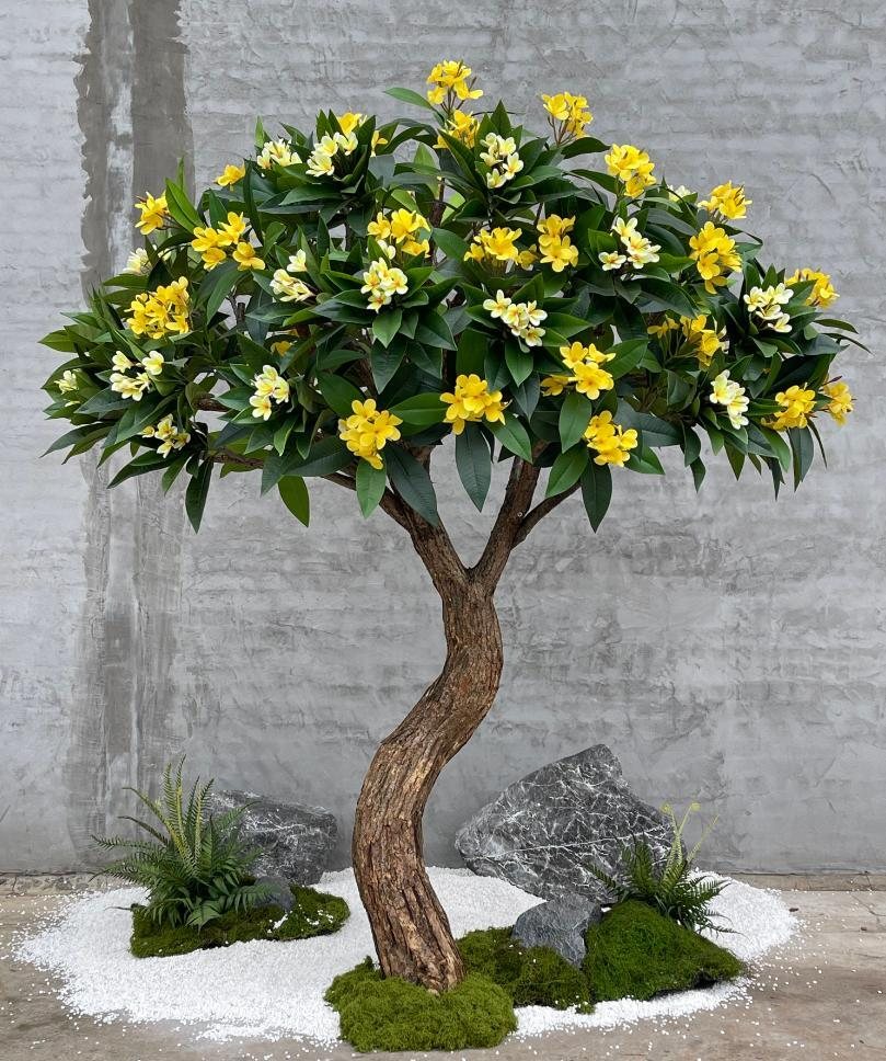 Artificial flowering tree with yellow flowers and green leaves